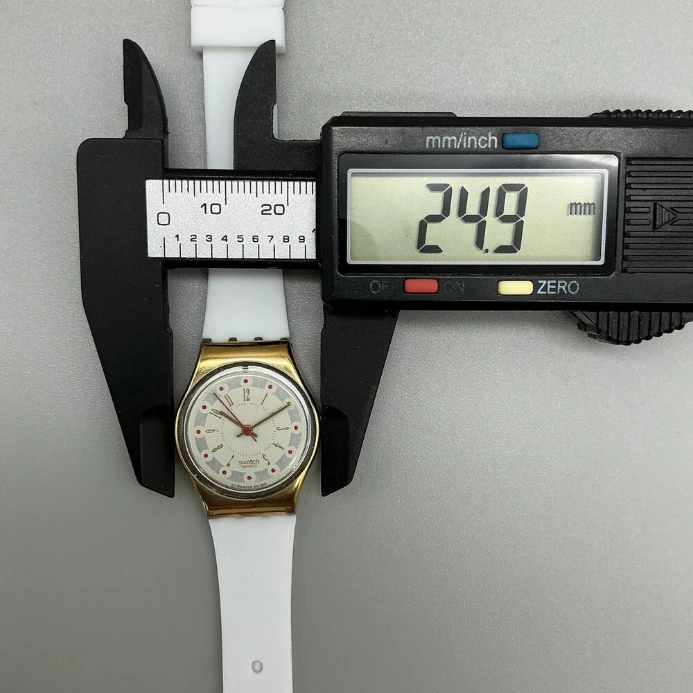 Vintage Swatch Womens Watch 25mm Cream Dial Gold Tone White Band Swiss Quartz